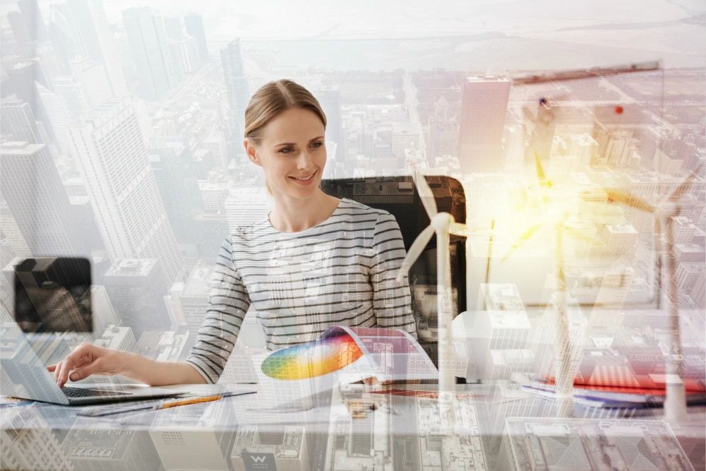 Professional working at laptop with business analytics